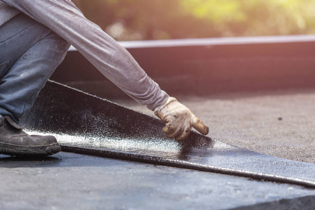 Professional Waterproofing technician working in Dennison, IL
